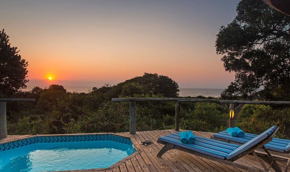 Sunset and pool at Thonga Beach Lodge